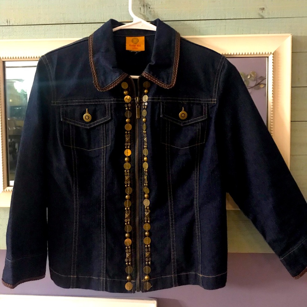Dark denim jacket with chic details!